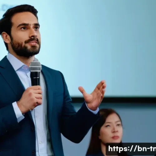 Home 27 무역협상가를 위한 프레젠테이션 스킬 - A professional male speaker, mid-thirties, wearing a sharp dark suit and a light-colored shirt, stan...